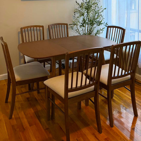 Extendable dining table shown opened to full length