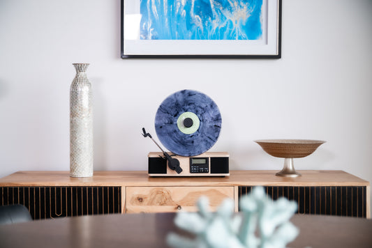 Fuse Wrap record player mounted vertically on a wall