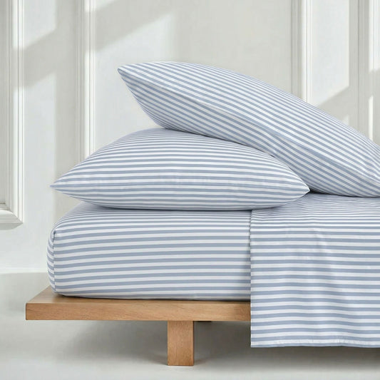 Sateen cotton sheets made up on a queen bed