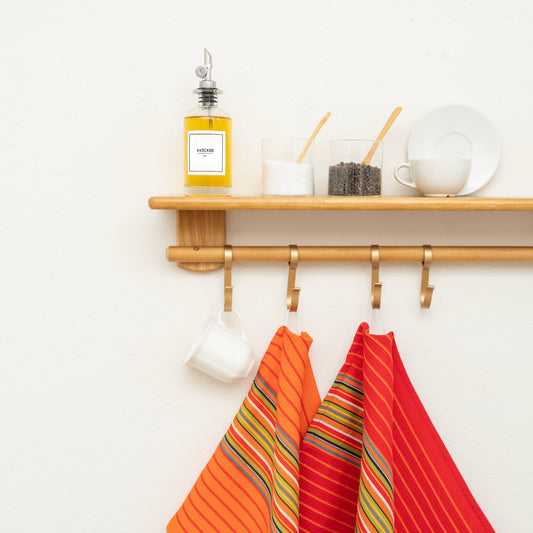 Striped kitchen towels folded in a stack