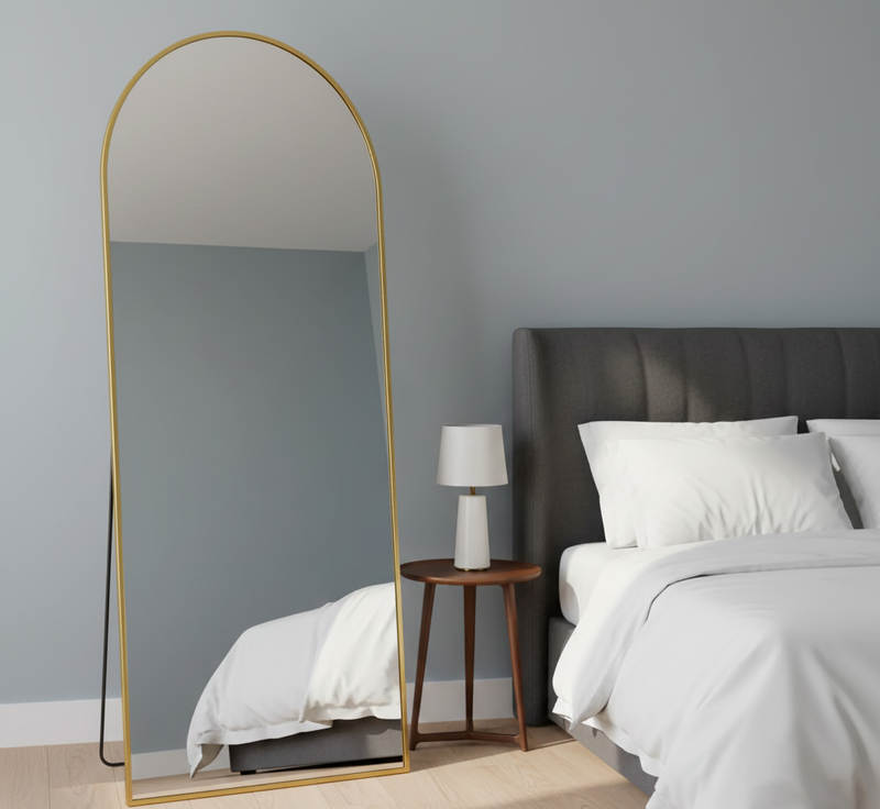 Full-length arched floor mirror with a stand