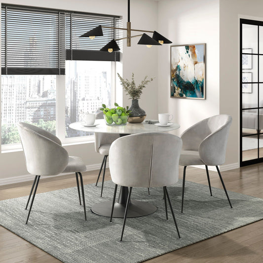 Pair of beige velvet side chairs on slim metal legs