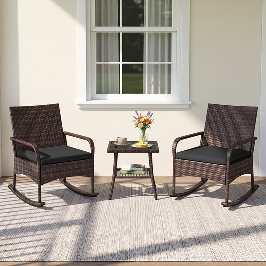 Three-piece rocking bistro set with two cushioned chairs and a side table