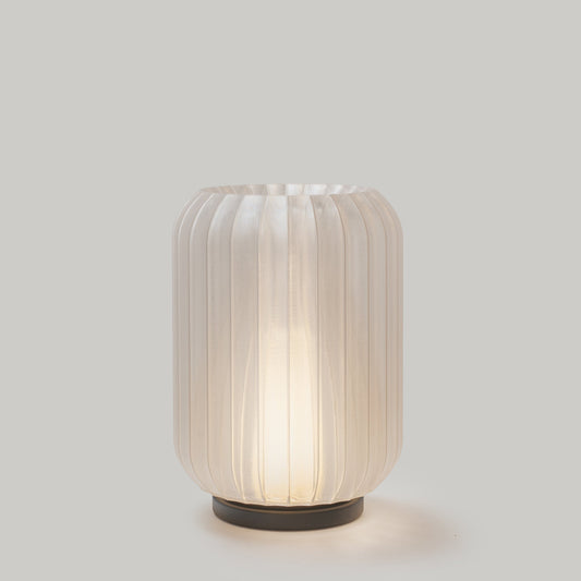Mini Allium cordless table lamp by Wooj Design in amber