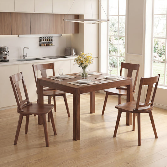 Set of four solid wood dining chairs with curved backrests