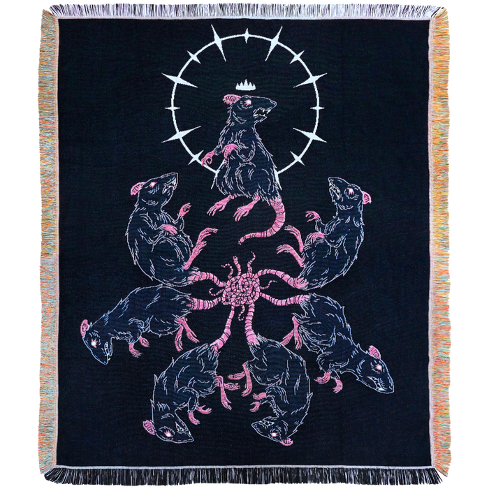 Rat King blanket draped over a sofa
