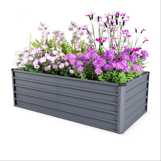 Large raised outdoor garden bed for growing vegetables and herbs